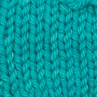 Bluegrass colored teal blue hand dyed yarn for knitting and crochet in different yarn types and skein sizes
