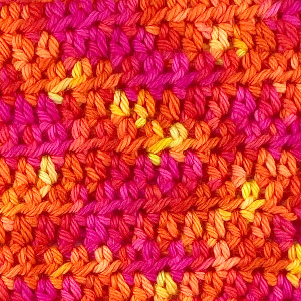hand dyed wool yarn magenta orange yellow neon decloaking star trek themed colors for knitting and crochet swatch