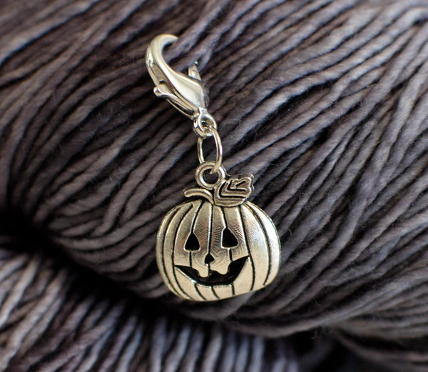 Jack-o'-Lantern pumpkin stitch marker for halloween to use with knitting and crocheting hand- dyed yarn