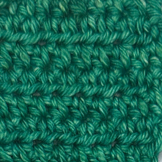 Emerald colored green hand dyed yarn for knitting and crochet in different yarn types and skein sizes