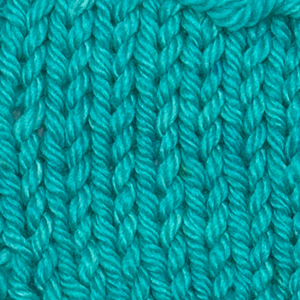 Bluegrass colored teal blue hand dyed yarn for knitting and crochet in different yarn types and skein sizes