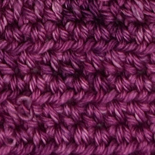 raspberry colored red purple hand dyed yarn for knitting and crochet in different yarn types and skein sizes