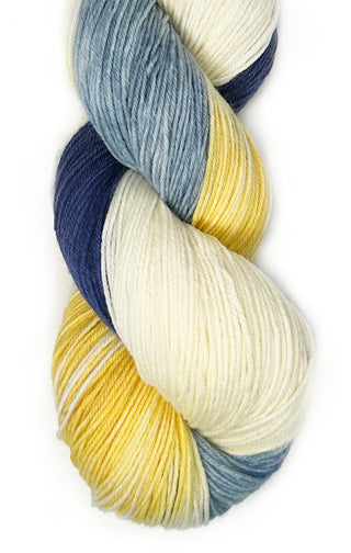 navy, blue, yellow, and cream hand dyed yarn for knitting and crochet from the mixtape collection