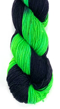 hand dyed wool yarn black and neon decloaking star trek themed sock and singles yarn knitting and crochet