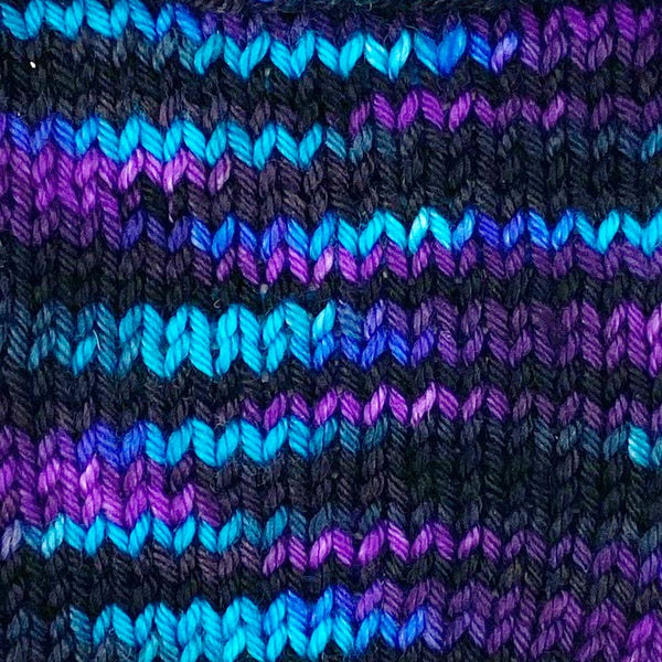 hand dyed wool yarn black purple blue defector romulan star trek themed colors for knitting and crochet swatch