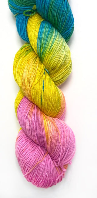  Hand dyed yarn in pink and yellow, and turquoise mixtape music colorway starman on wool yarn fingering, dk, worsted, and bulky