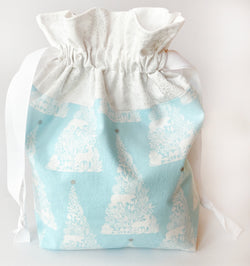 the woolly dragon knitting or crochet project bag hand sewn icy blue and white drawstring
